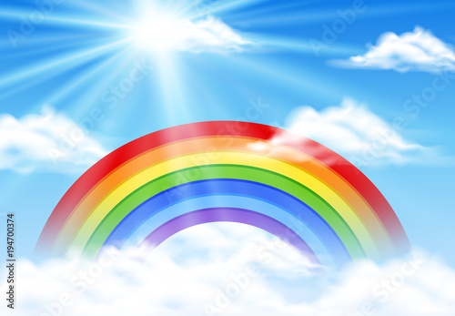 Colorful rainbow in blue sky