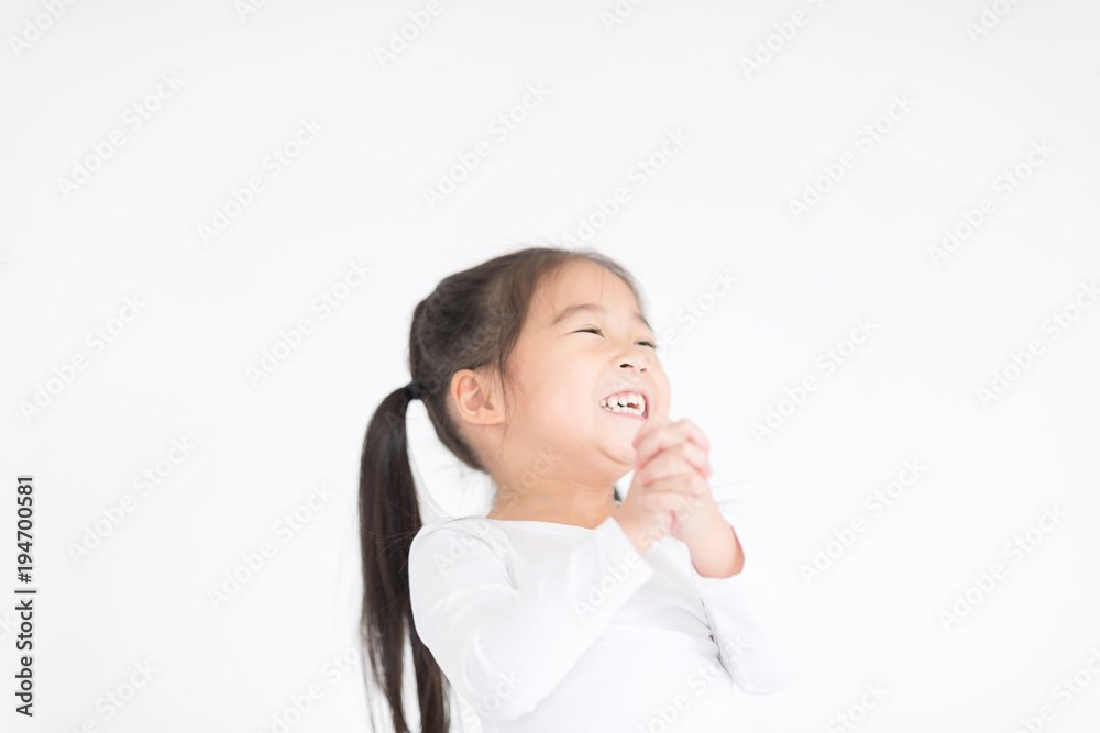 Little girl is happy and laughing . Educational toys for preschool and kindergarten child. Little girl on Daycare Education concept Little girl is happy and laughing . Educational toys for preschool and kindergarten child. Little girl on Daycare Education concept