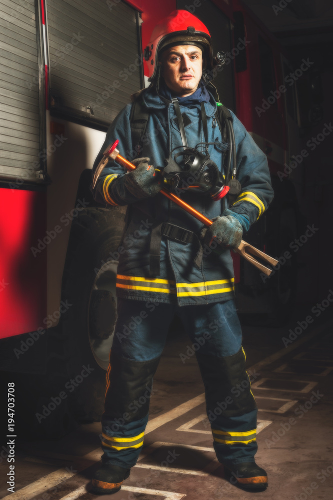 Firefighter with a tool Firefighter with a tool