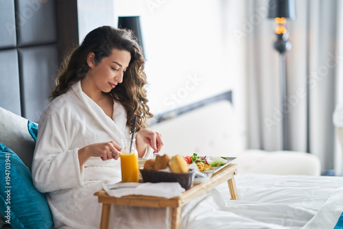 Breakfast in bed, cozy hotel room