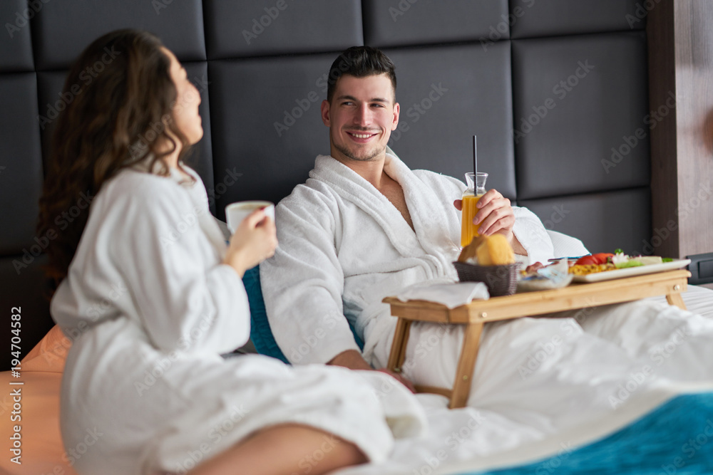 Breakfast in bed, cozy hotel room Breakfast in bed, cozy hotel room