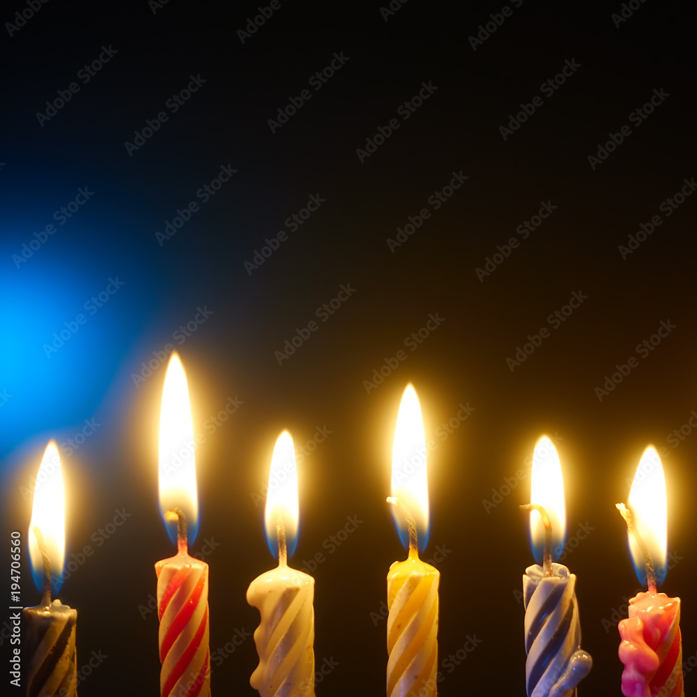 Holiday candles in a row Holiday candles in a row