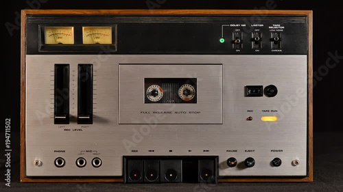 Old cassette player playing music retro style