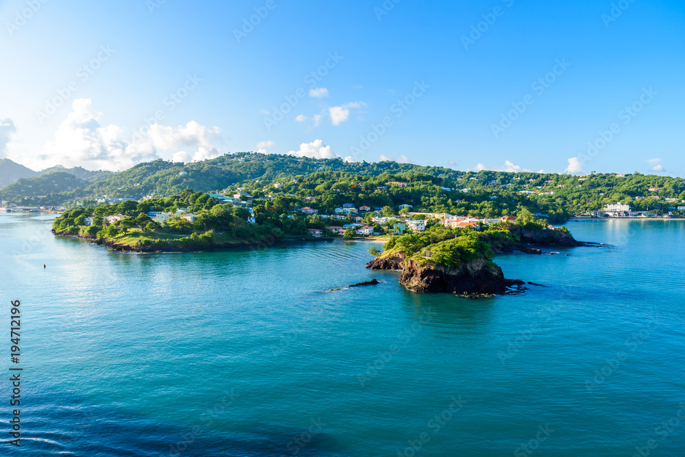 Tropical coast on the Caribbean island of St. Lucia. It is a paradise destination with a white sand beach and turquoiuse sea.