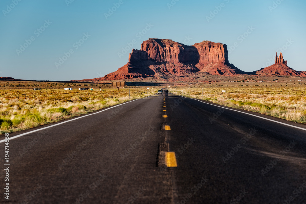 Empty scenic highway in Monument Valley Empty scenic highway in Monument Valley