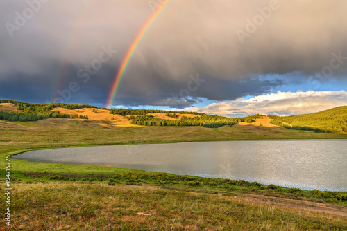 mountains lake rainbow clouds summer