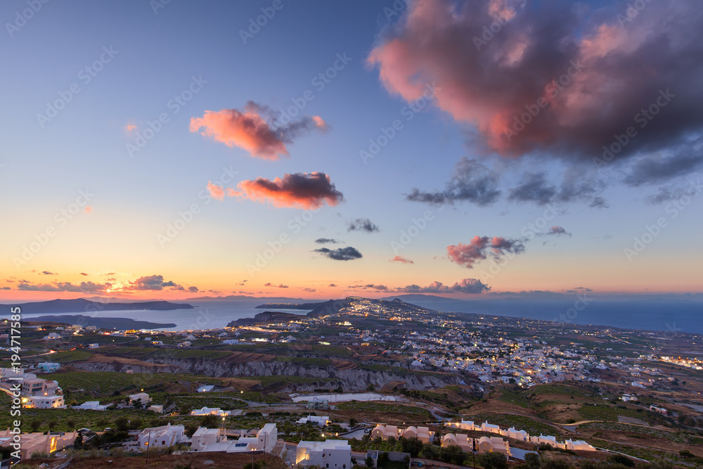 Fototapeta premium Panorama of Santorini island towards the setting sun