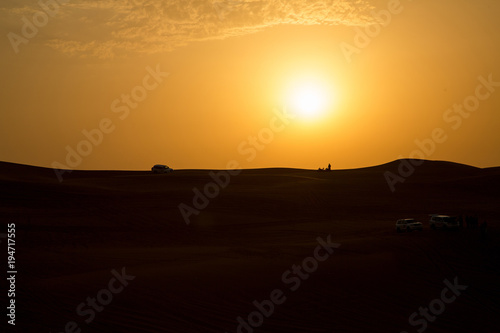  Sunset in dessert of Dubai © Kartouchken
