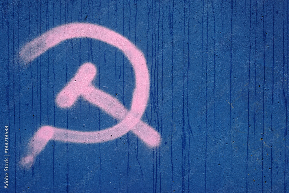 Hammer und Sichel an der Mauer / Das Symbol Hammer und Sichel der