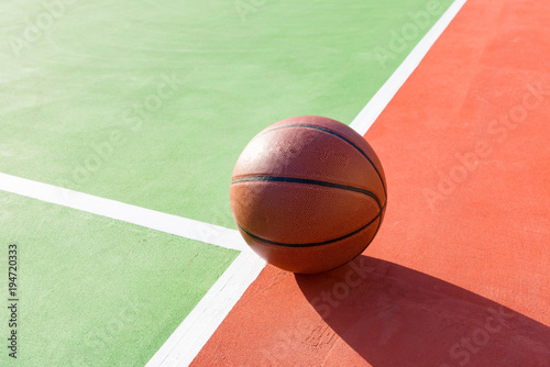 basketball on an outdoor playing field in a day time close up © Freer