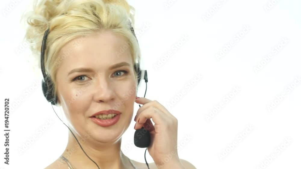 Sexy laughing woman talking on helpline, Headset telemarketing positive female call center agent at work. Sexy laughing woman talking on helpline, Headset telemarketing positive female call center agent at work.