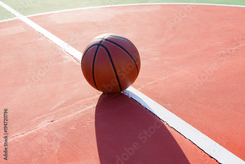 basketball on an outdoor playing field in a day time