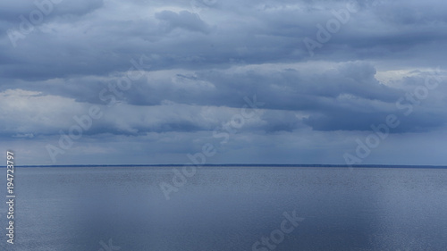 Landscape background of a river in bad weather. Horisontal view