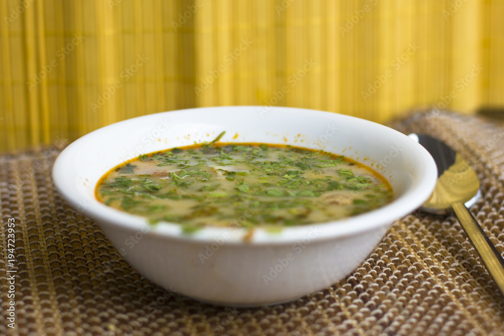 Spicy soup Tom Yam with shrimps and greens Spicy soup Tom Yam with shrimps and greens