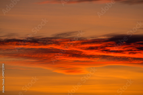 sunset in the winter frosty evening in the Russian outback