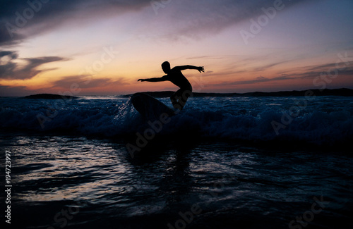 Sunset surfing