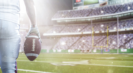closeup American Football Player isolated on big modern stadium