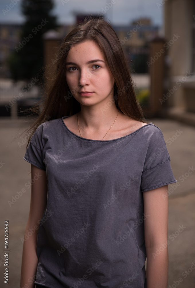 Girl on a walk in the spring day