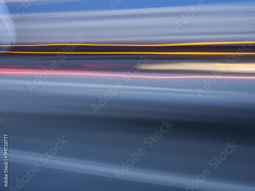 Cars lights in movement at highway.