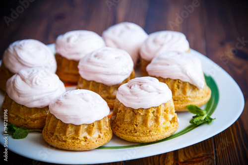 sweet muffins with berry cream