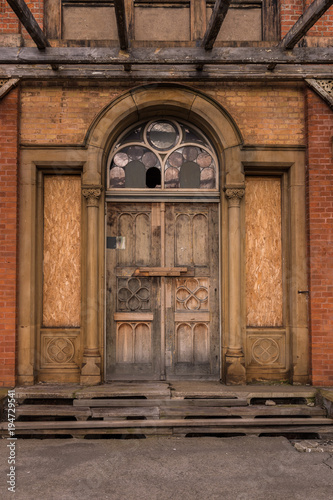 The old door of a ruined building © wlad074