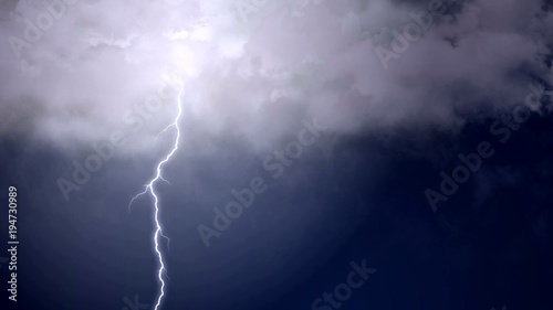 Magic shot of rapid lightning forks striking in clear night sky, meteorology