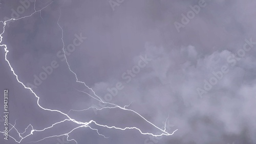 Bad weather consequences, electric firebolt flashing down towards the ground