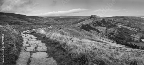 Beautiful black and white landscape of Mam Tor in Peak District during autumn.