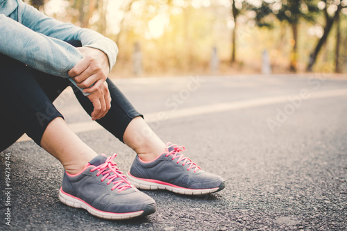 Woman exercise and rest on road , color of hipster tone selective and soft focus