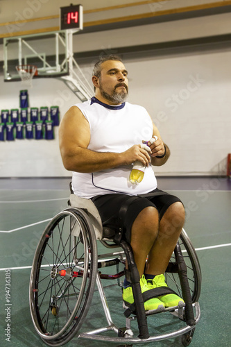 disabled sport men relaxation while playing basketball © Marino Bocelli