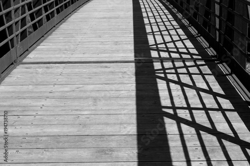 walking bridge shadows and line