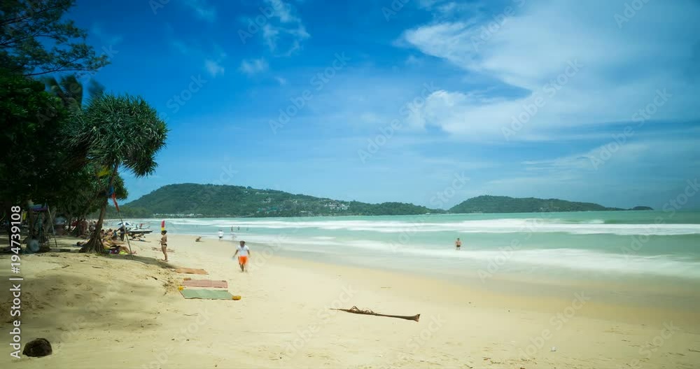 Time lapse of people relaxing at Patong Beach, Phuket, Thailand. Time lapse of people relaxing at Patong Beach, Phuket, Thailand.