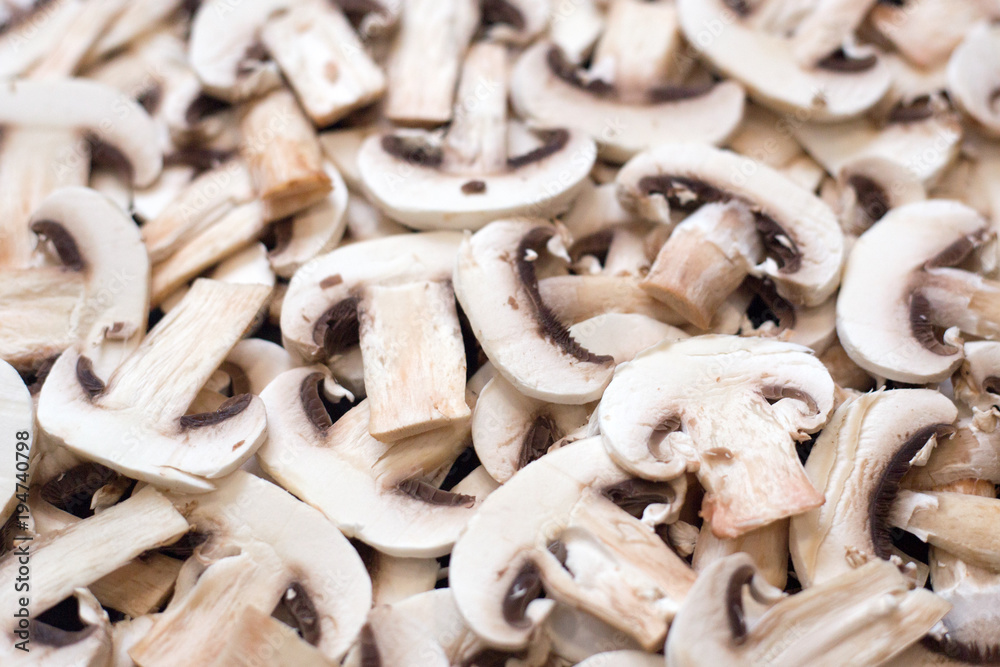 Healthy eating. Mushrooms champignons cut into slices Healthy eating. Mushrooms champignons cut into slices