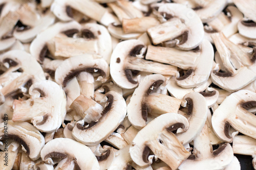 Healthy eating. Mushrooms champignons cut into slices of healthy food. Mushrooms champignons cut into slices close-up