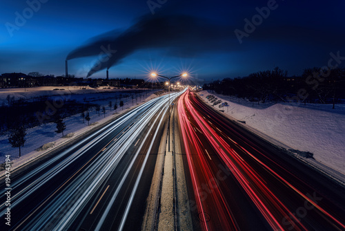 Blurred traffic lights at blue hour in highway