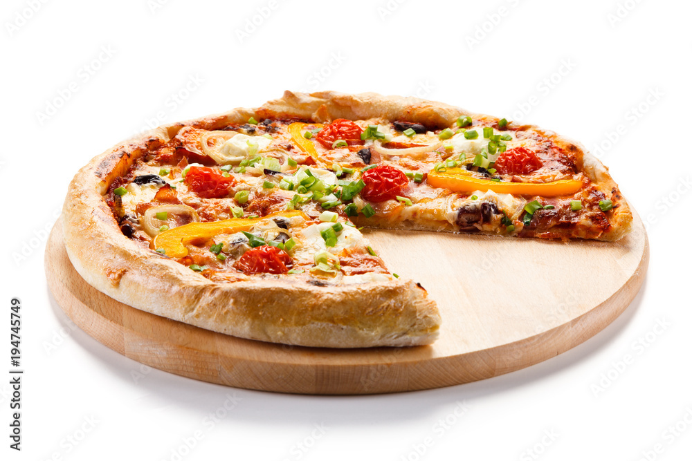 Pizza with ham and vegetables on white background Pizza with ham and vegetables on white background
