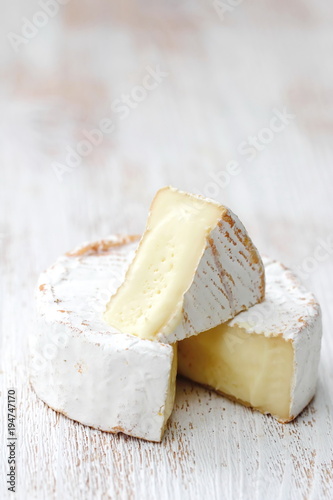 Brie type of cheese. Camembert cheese.