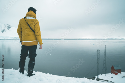 Man enjoying the Brown Station Panorama - Antarctica photo