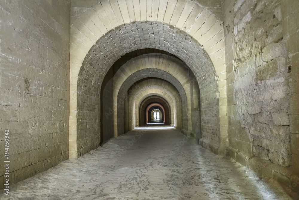 corridor in an old fortress with ceiling vaults