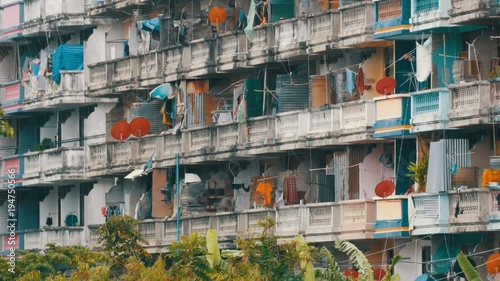 PATTAYA, THAILAND - December 16, 2017: Very poor area of the city where the poor and the poor live. Dirty and not well-groomed house for the poor photo