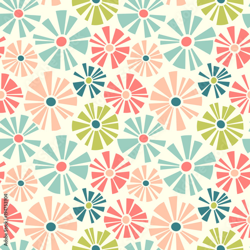 Spring theme seamless pattern of cut out style daisies. Cheerful retro design for fabric, wallpaper, backgrounds and decor.