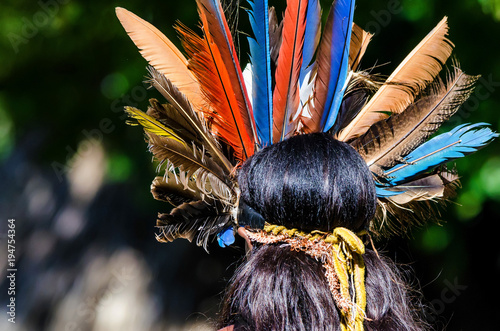 Obraz na plátně Back view of woman in traditional Creole headwear