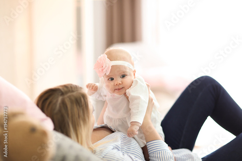 Young mother and her baby o...