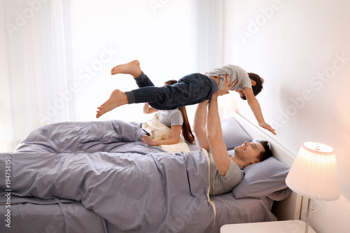 Cute children with parents ...