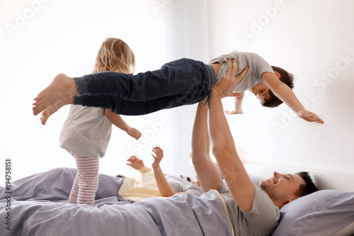 Cute children with parents ...