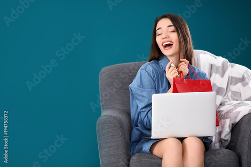 Young woman shopping online...