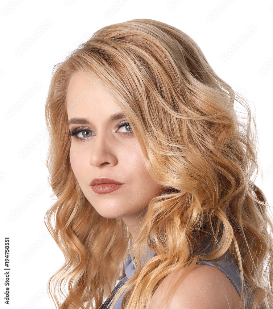 Beautiful young woman with long wavy hair on white background Beautiful young woman with long wavy hair on white background