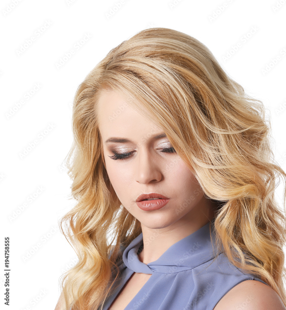 Beautiful young woman with long wavy hair on white background Beautiful young woman with long wavy hair on white background