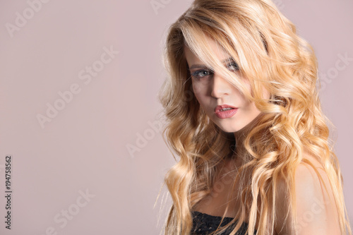 Beautiful young woman with ...