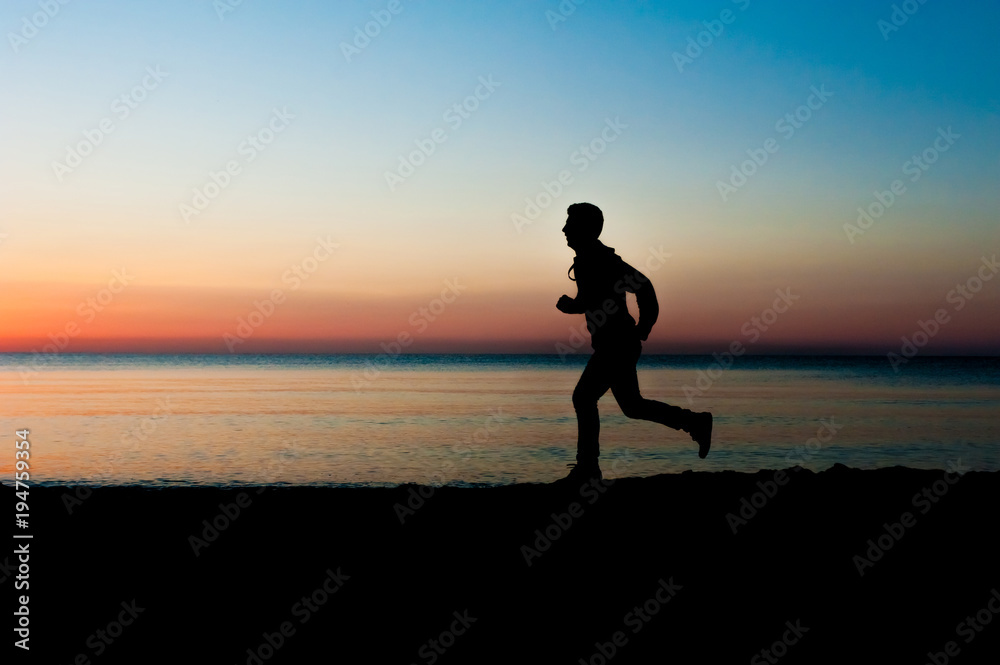 Silhouette of runner old man in the morning at the beach, sunrise Background.